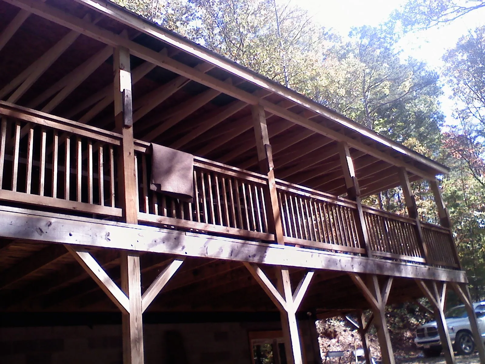 Timber framing under a new elevated porch and deck — Roof Leak Repair in Quaker City by Roofing Brothers
